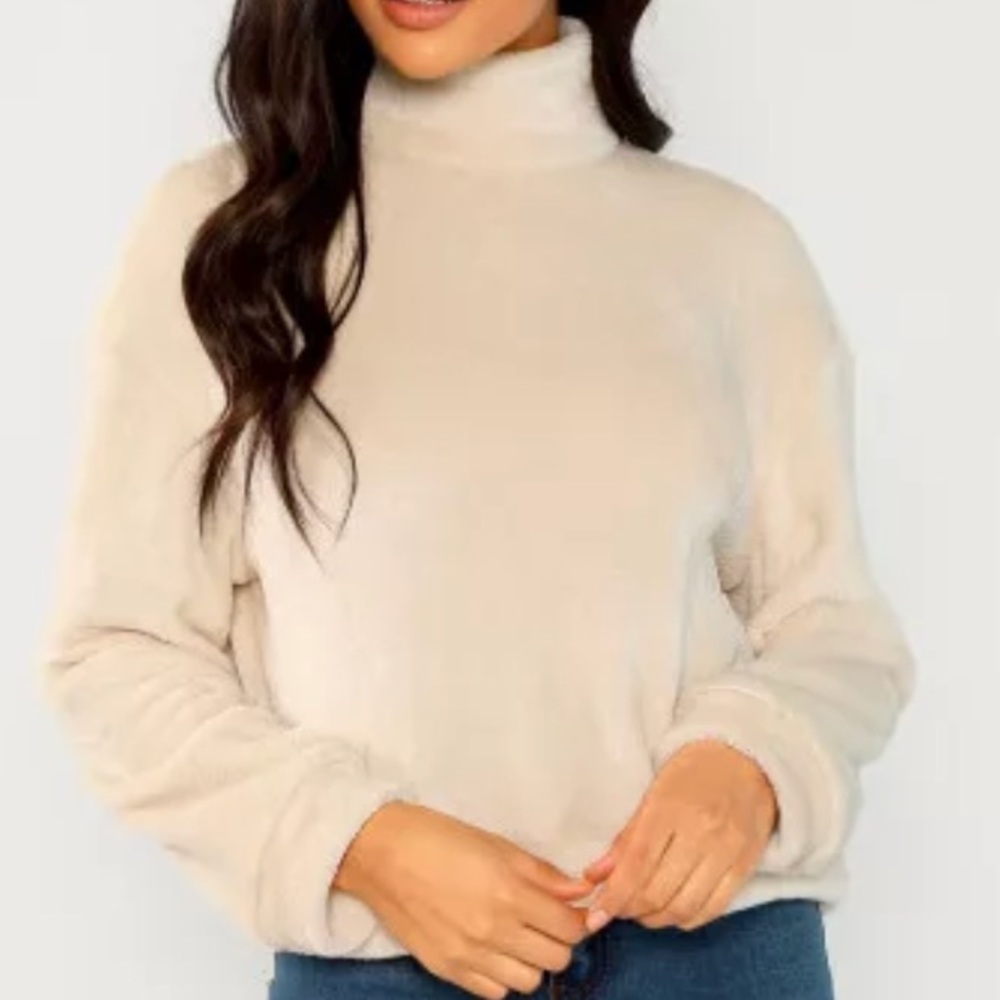 High neck faux fur pull over